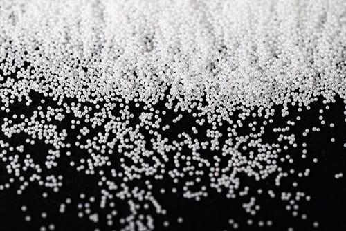 How to choose the particle size of zirconia beads in a sand mill
